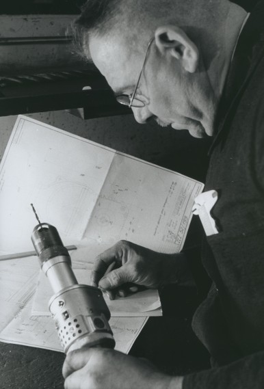 Bosch mechanic with an early Bosch power tool, 1937