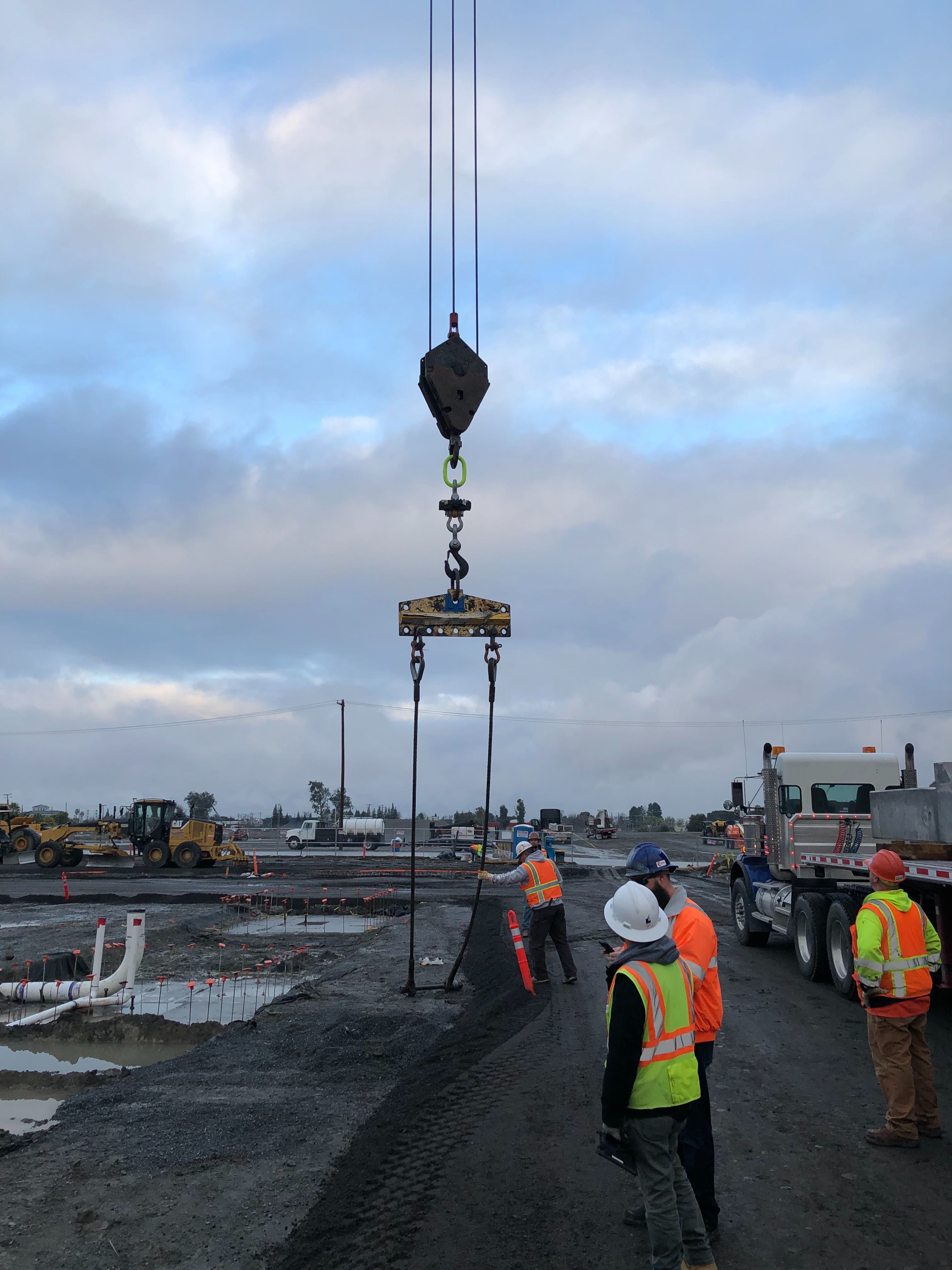 Versatile Natures' sensor device hung under the hook of a crane