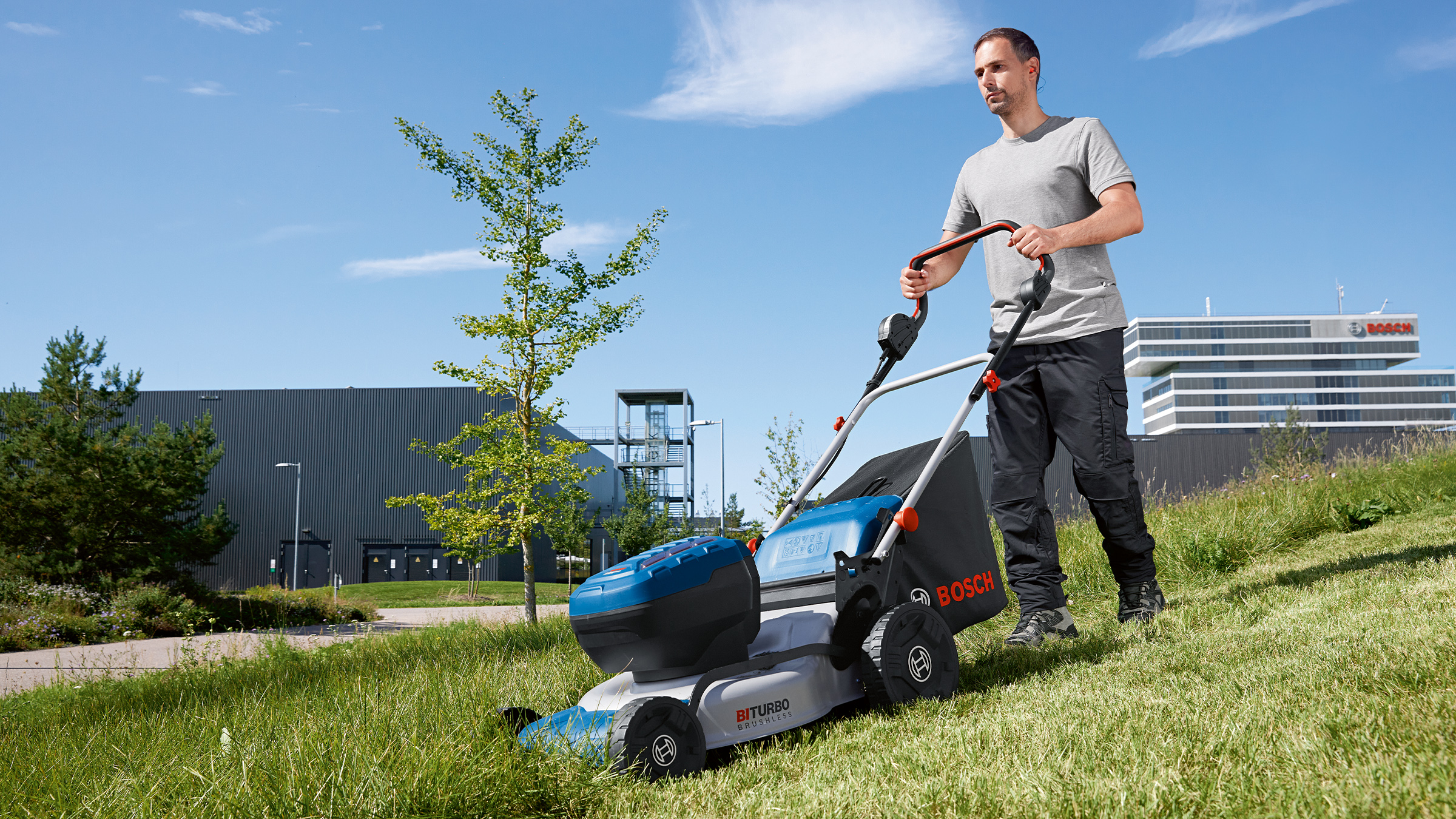 Powerful Bosch Professional cordless lawnmower and dual charger