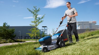  Powerful Bosch Professional cordless lawnmower and dual charger for faster char ...
