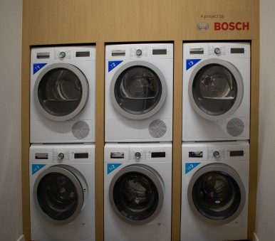 Sustainable washing and drying in communal laundry rooms